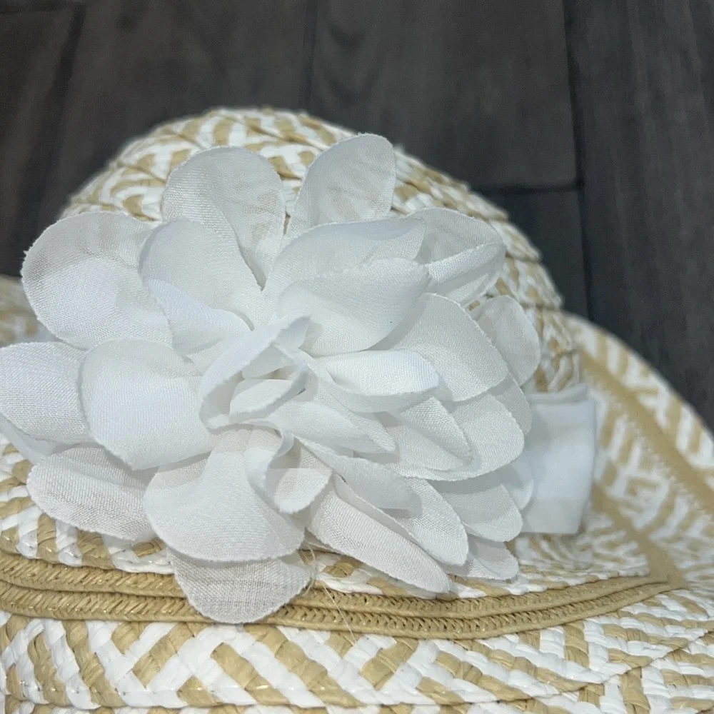 Infant stylish brim sun hat with sheer like floral sash.